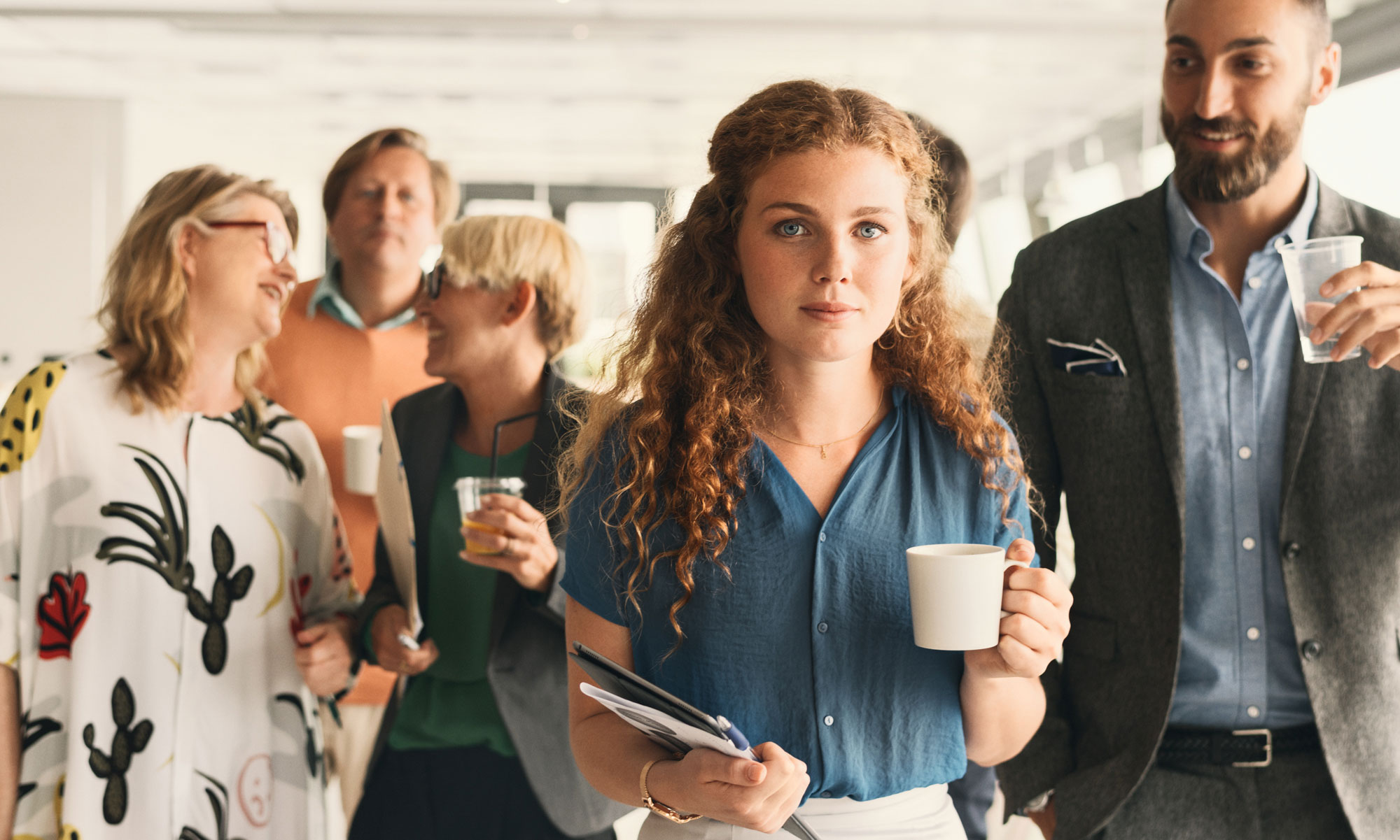 A group of colleagues at a coffee break.